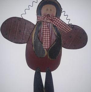 Adorable primitive hanging ladybug